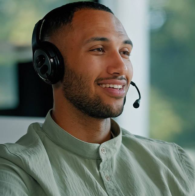 call center agent smiling with green shirt